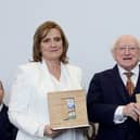 Orlaith and Ciaran Staunton receiving the Presidential Distinguished Service Award for the Irish Abroad from President Michael D. Higgins in December 2022