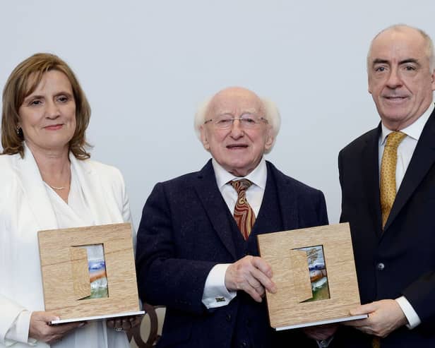 Orlaith and Ciaran Staunton receiving the Presidential Distinguished Service Award for the Irish Abroad from President Michael D Higgins in 2022