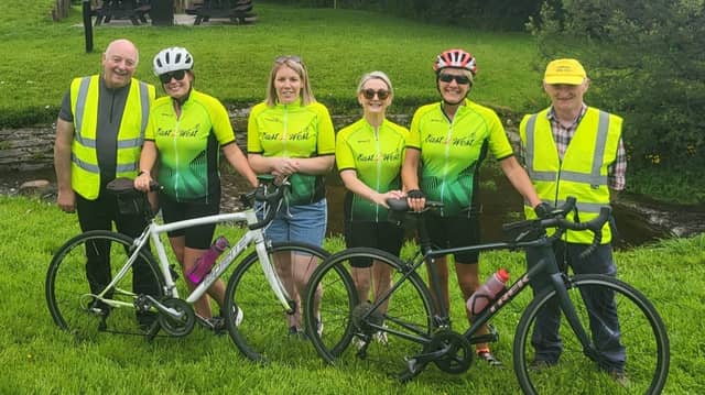 Pictured are members of the Louisburgh Men’s Shed with four locals who are members of the cycling squad. L-R Eamon O’Malley, Claire Caulfield, Evelyn Bonnar, Bernadine Ball, Agnes Cox and Joe Fergus