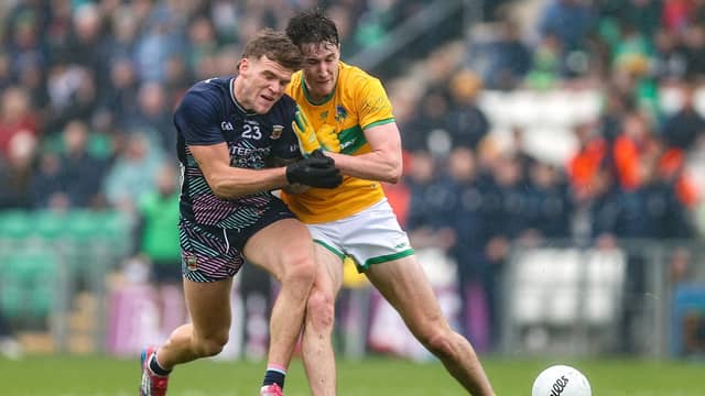 Jordan Flynn and Leitrim's Barry McNulty collide in today's Connacht semi-final in Carrick-on-Shannon. Pic: Sportsfile