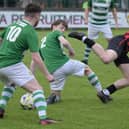 Westport United’s Cian Halpin flies over Celtic’s Mark Cunningham (2) with Jason Hunt (10) and Cathal Coyne watching (Pic: John Corless)