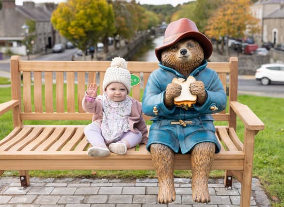 1-year-old Cadhla Sammon from Newport pictured with Paddington Bear at The Fairgreen on Westport (Pic: The Mayo News)