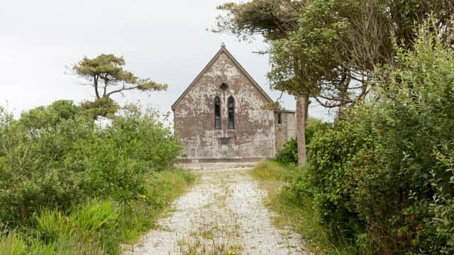 A picture of the old church building in Achill before the installation of solar panels