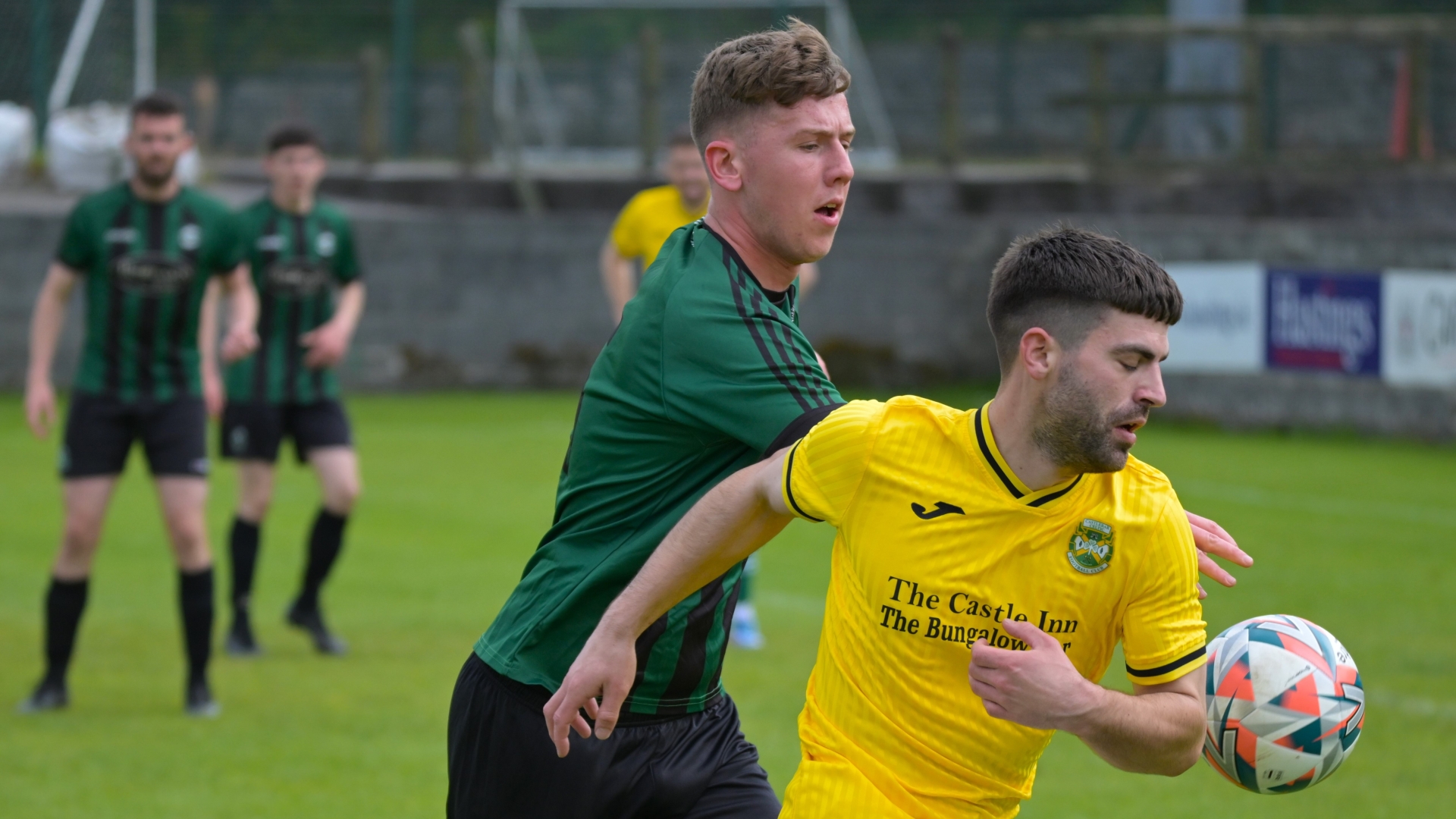 Conn Rangers’ Mikey McHale is beaten by Castlebar Celtic’s Johnny Cocozza (Pic: John Corless)
