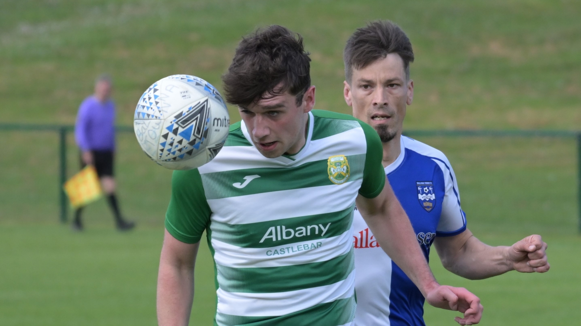 Castlebar Celtic's Eoin Hughes and Ballina Town's Chris Moore