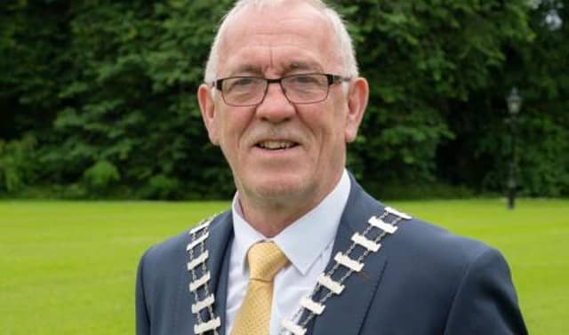 Cllr Seamus Weir wearing the chain of office of Cathaoirleach of Mayo County Council