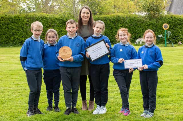 Tooreen NS was named Northwestern Travel School of the Year. Pictured from left: Karl Grealy, Oisin Nolan, Seán Cassidy, Teacher, Siobhán Conboy, Katie Mae Gavin, Emily Cribben, Sylvie Mulrennan.