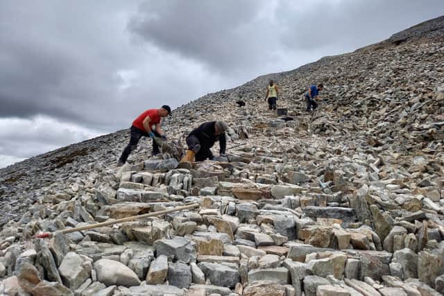 Helen presented each member of the team with a copy of the book, ‘Irish Peaks’, published by Mountaineering Ireland and now in its second edition.
