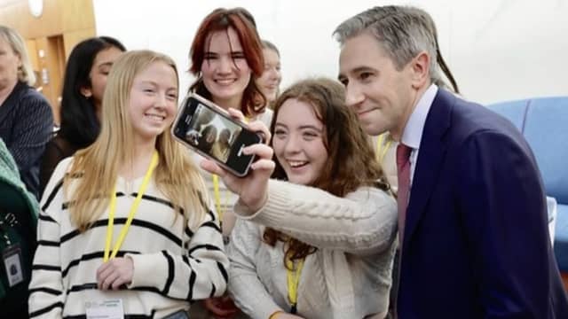 Sinéad Murray taking a photo with incoming Taoiseach, Simon Harris