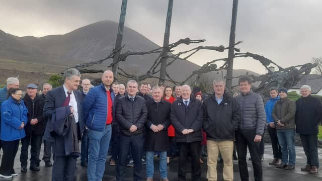 Local elected representatives pictured with members of the Murrisk community