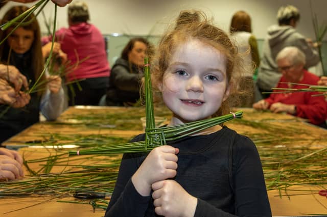 Katie Shannon Clarke with the St Brigid's cross she made at the National Museum of Ireland - Country Life, Turlough Park, Castlebar (Pic: Karen Cox)