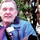 The late Western People photographer Henry Wills with his camera (Pic: Western People)
