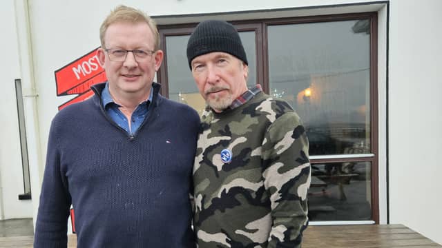U2 guitarist The Edge enjoyed a visit to Achill Island on New Year's Day. He is pictured with Alan Gielty of Gielty's Bar and Restaurant in Dooagh having enjoyed a New Year's Day lunch