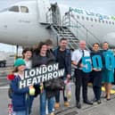 James Doyle,  50,000th passenger on the Knock/Heathrow service pictured with his wife Clare and three children. Also Pictured also are the Aer Lingus cabin crew and pilot.