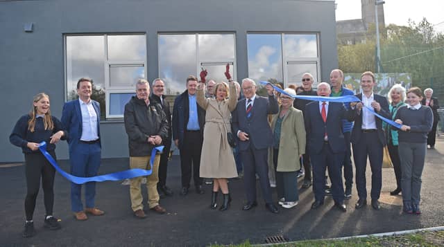 Pictured at the opening of the new extension at Newport NS is former school principal Bríd Chambers and Chairperson of the Board of Management Joe McGovern cutting the ribbon. Pic: Conor McKeown