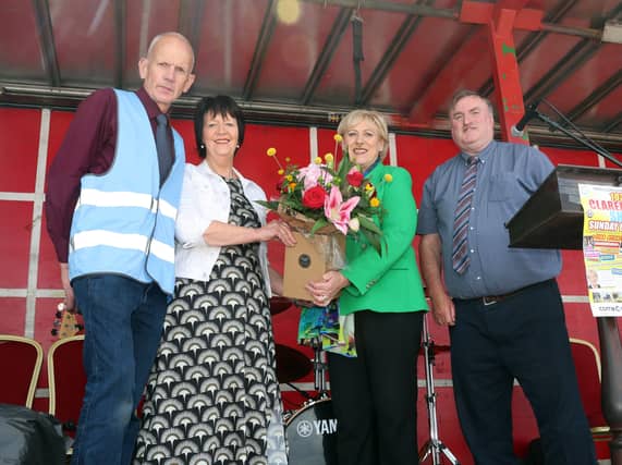 Maureen Finnerty, Secretary, Claremorris Agricultural Show makes a presentation to Minister for Social Protection and Rural and Community Development, Heather Humphreys, TD
