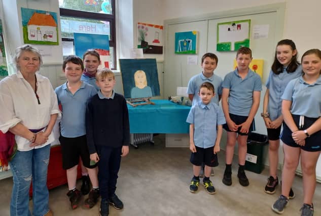 Marguerite Gannon with the children of Drummin NS – Hugh Gibbons, Lucy Gibbons, Ben Grimes, Adrian Garrivan, Kian Grimes, Martin Heraty, Erica Garrivan and Kitty Gibbons. (Missing: Milo McDonald)