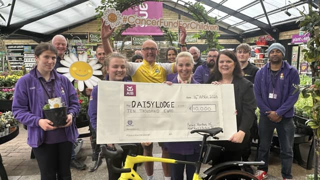 Pictured Mairead Geehan Partnership and Philanthropy Executive at Cancer Fund for Children, and Paraic Horkan, Director of Horkans Group and owner of Horkans Castlebar with staff of Horkans Castlebar