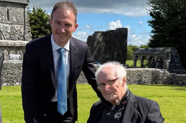Minister Alan Dillon pictured last month with Fr Frank Fahey in the grounds of Ballintubber Abbey.