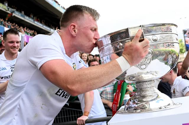Mayo’s Ryan O'Donoghue kisses the Sam Maguire in Croke Park.