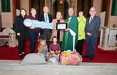 Pictured at the official announcement are Bridget Mc Loughlin, Dr Louise Freeman, (Westport Committee), Frank Dolan, Maura Kiely (chairperson), Fr John Kenny, ADM Noreen Mc Greal, and Brian Moran, and children Sopie Kiely and Erris Cuffe