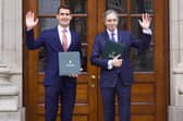 Minister Jack Chamber and Tánaiste Simon Harris on the steps of Leinster House this afternoon. 