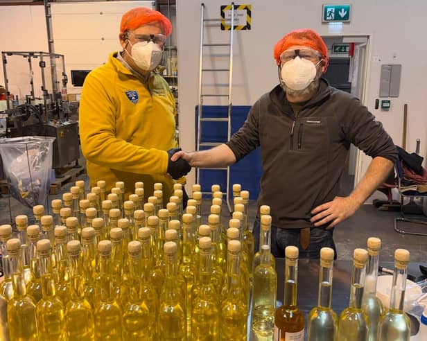 Dr Sean O'Connor, founder of Wild Atlantic Mead (left), with Damien Corrigan of DEM Bottling Solutions, Ballina, at the bottling of the first batch of Wild Atlantic Mead in September 2026