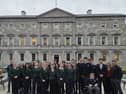Students and staff from St Louis Community School pictured with TD Paul Lawless in front of Leinster House