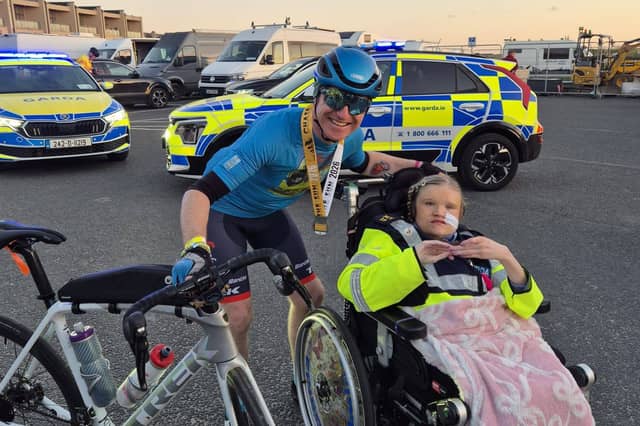 Community Garda John Monaghan with Honorary Garda Saoirse Duggan