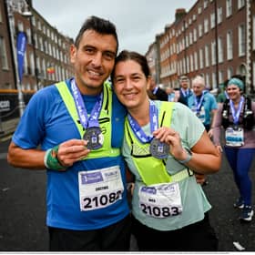 Anca Trulea (right) and Costinel Trulea (left) during the 2024 Irish Life Dublin Marathon