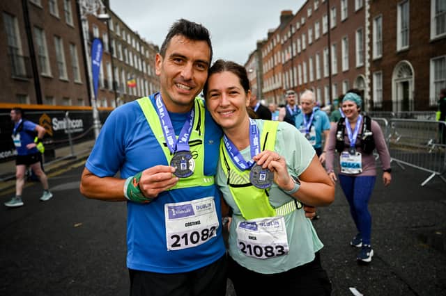 Anca Trulea (right) and Costinel Trulea (left) during the 2024 Irish Life Dublin Marathon