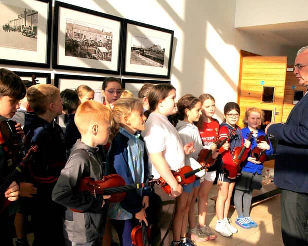 Minister Dara Calleary speaks to young musicians from Music Generation Mayo Erris Strings Project at Aras Inis Gluire