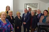 Pictured from left at the unveiling are Breege Staunton, Katriona Gillispie, Jacqueline Horan, Evelyn Horan, Cllr Brendan Mulroy, Cathaoirleach of Westport Belmullet Municipal District; Dara Calleary, Minister for Social Protection and Minister for Rural and Community Development; Cormac Ó Cionnaith, Pat Kenny and Deirdre Adams. Margaret Adams served as Chairperson on the Board of the Custom House Studios Gallery for 23 years.