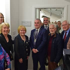 Pictured from left at the unveiling are Breege Staunton, Katriona Gillispie, Jacqueline Horan, Evelyn Horan, Cllr Brendan Mulroy, Cathaoirleach of Westport Belmullet Municipal District; Dara Calleary, Minister for Social Protection and Minister for Rural and Community Development; Cormac Ó Cionnaith, Pat Kenny and Deirdre Adams. Margaret Adams served as Chairperson on the Board of the Custom House Studios Gallery for 23 years.