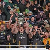 James Carr hoists the Pete McDonnell Cup to the heavens as Ardagh are crowned county champions.