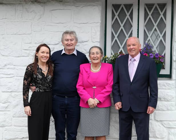 The Collins family who run the Quiet Man Museum in Cong are delighted with the news that Cong hopes to twin with John Wayne’s hometown. They are pictured with Michael Commins of The Mayo News. 