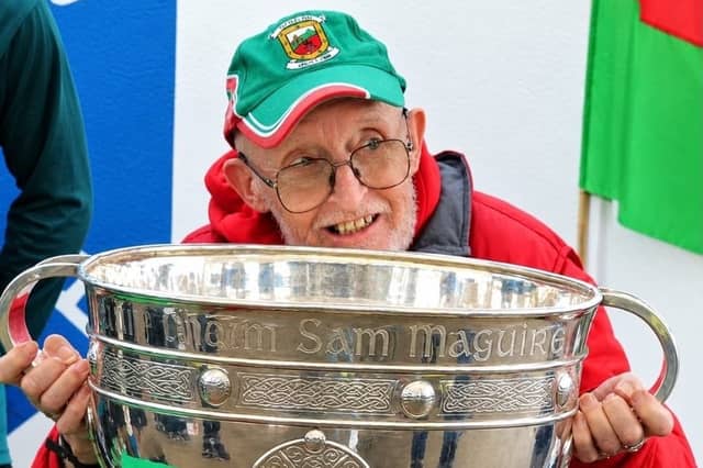 The late John Regan pictured recently with the Sam Maguire Cup in Kiltimagh.