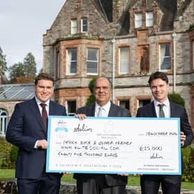 Pictured are Sir Stelios Haji-Ioannou (centre), Patrick Joyce (left) and Oliver Feeney (right) of X-LITE Beverages with a cheque for €25,000 as a Bronze Award winner at the Stelios Foundation North-South Business Co-operation Awards