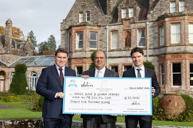 Pictured are Sir Stelios Haji-Ioannou (centre), Patrick Joyce (left) and Oliver Feeney (right) of X-LITE Beverages with a cheque for €25,000 as a Bronze Award winner at the Stelios Foundation North-South Business Co-operation Awards
