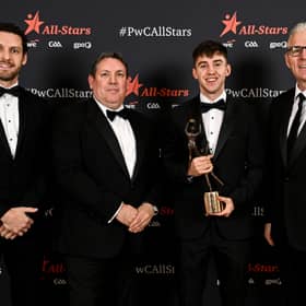 Mayo footballer Enda Hession is presented with his PwC GAA/GPA All-Star award by, from left, Gaelic Players Association chief executive Tom Parsons, PwC managing partner Enda McDonagh and Uachtarán Chumann Lúthchleas Gael Jarlath Burns during the 2026 PwC GAA/GPA All-Star Awards at the RDS in Dublin. Pic: Seb Daly/Sportsfile  