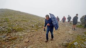 Over 4,000 climb Croagh Patrick for Reek Sunday despite wet weather
