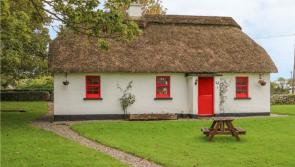 Holiday Haven: Charming cluster of 12 thatched cottages on sale for seven-figure sum 