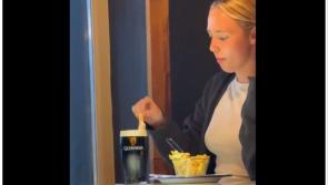 People divided as footage of woman dipping chips in Guinness goes viral