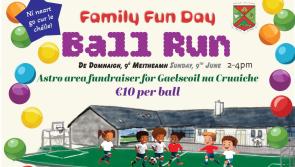 A bulldozer, a ramp and lots of balls and prizes   