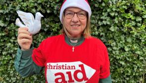 Westport clergywoman hangs ‘dove of peace’ in support of Christian Aid