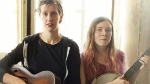 American duo pool talents for folk show 