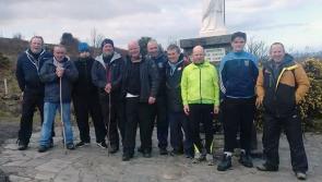 Westport duo climb Reek one backward step at a time