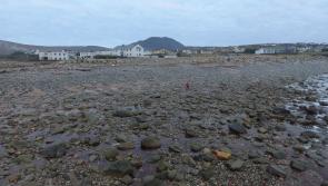 Famous Achill beach returns once again to the Atlantic