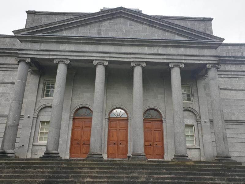 Garda catches woman driving with 13 year old son 'hanging out' car window
