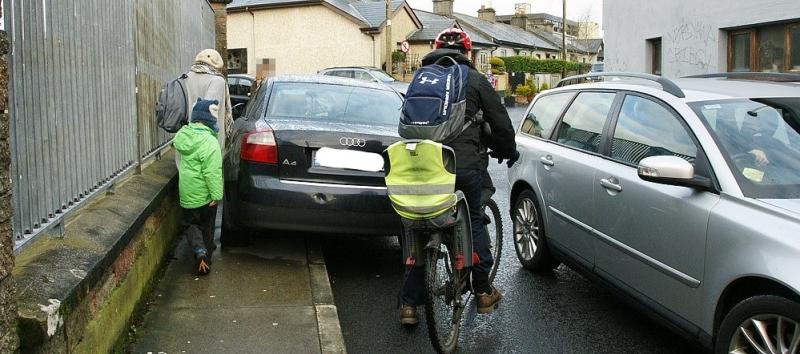 A Mayo councillor has called for more action to be taken against motorists who park on foopathsOffaly increases fines for parking on footpaths, bus and cycle lanes 